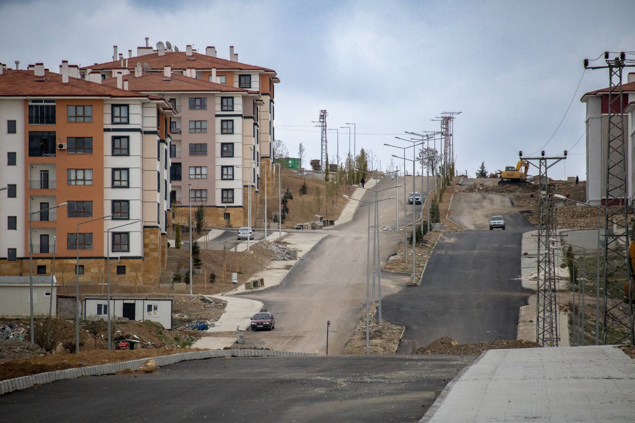 View of residential buildings and roads under construction in Palu, Elazığ, Türkiye.